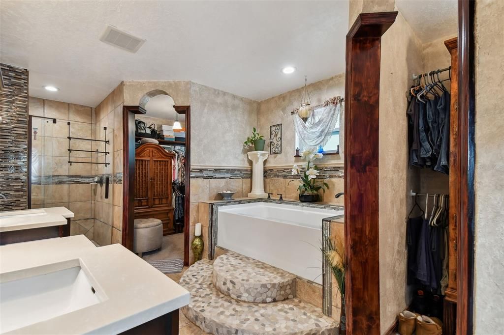 Dream bathroom with dual walk-ins, dual vanity