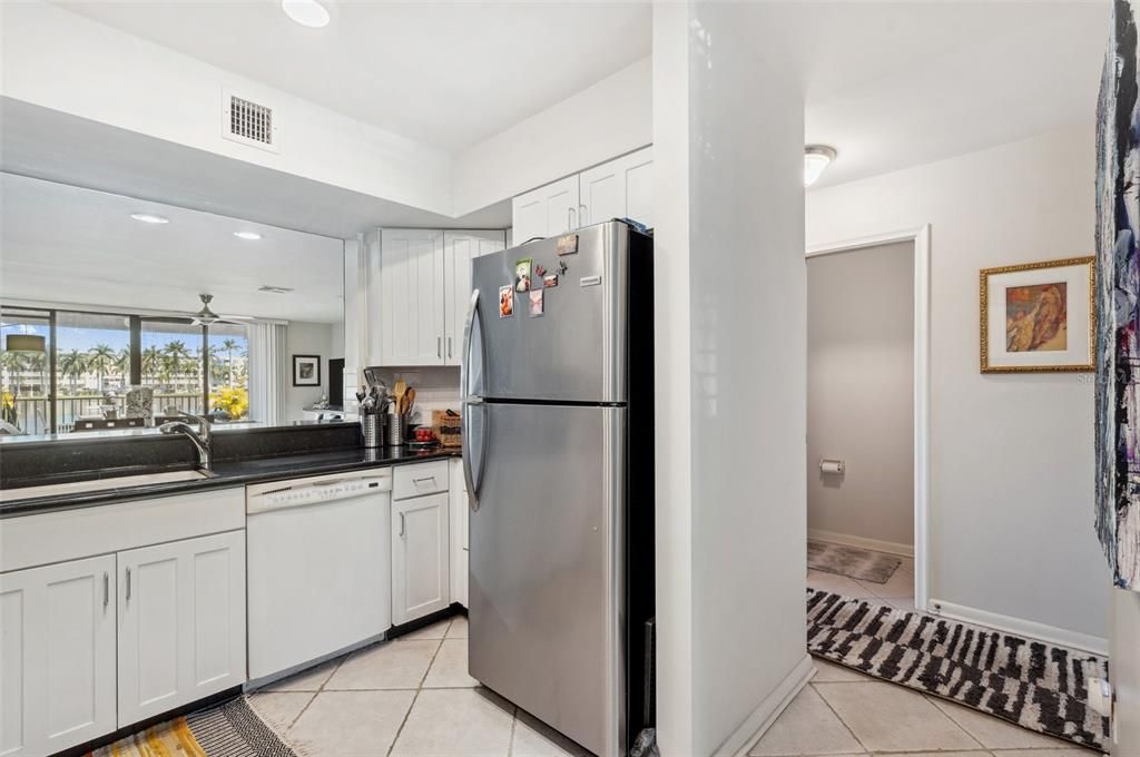 View hall to kitchen and even to the patio and water views !!