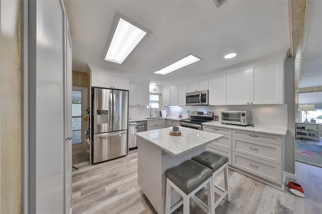 Beautiful updated Kitchen, Center Island is on wheels and can be moved to anywhere!