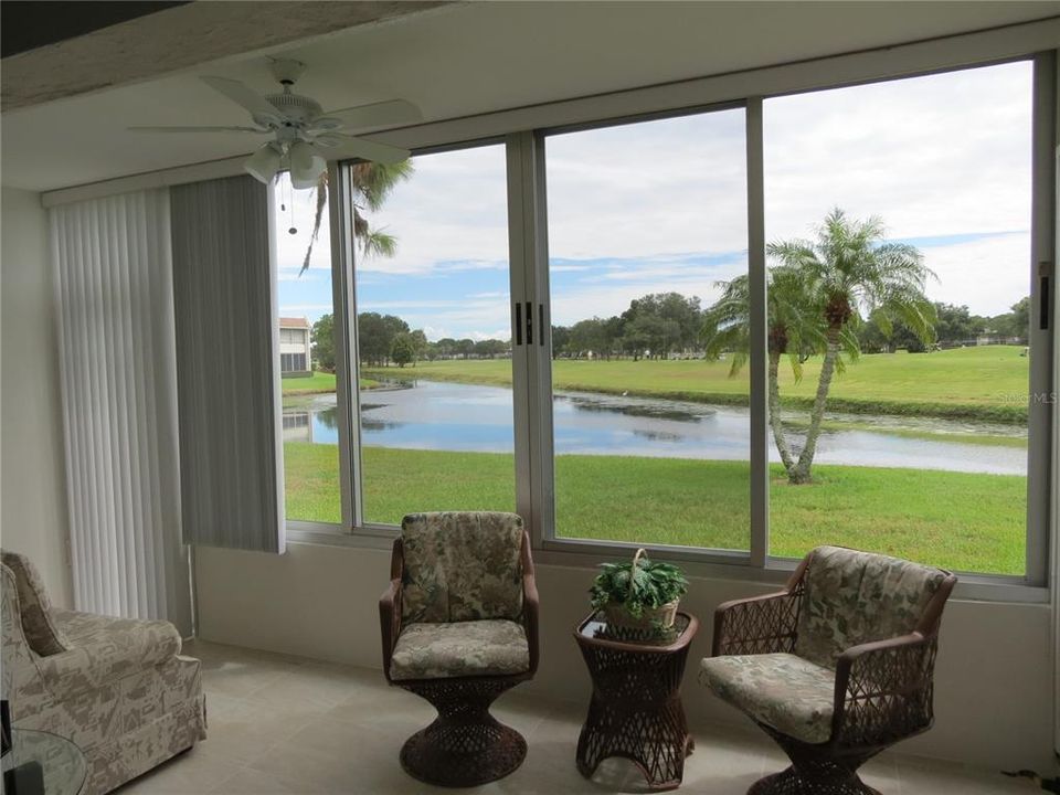 Florida Room with Lake & Golf Course Views