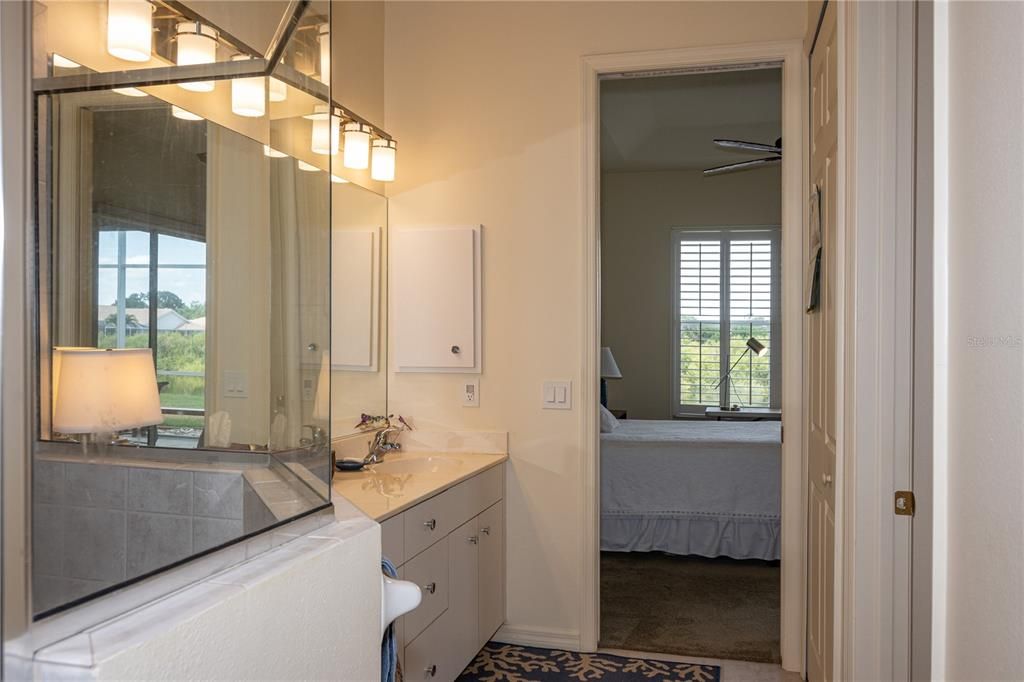 Primary Bathroom with view to bedroom