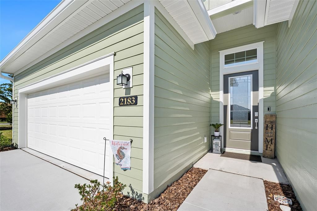 Welcoming entryway with striking front door