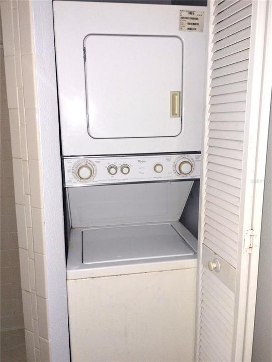 Stackable Washer and Dryer in Master Bathroom