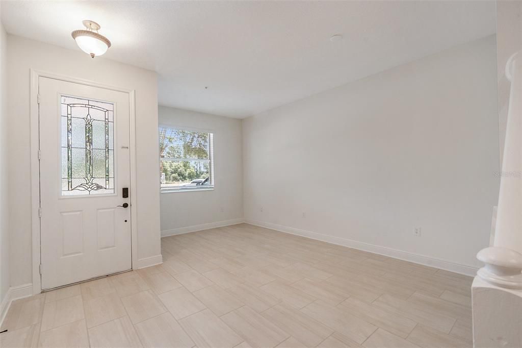 Spacious entry way with a flex space - perfect for a formal dining room or an office!