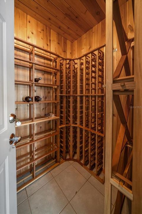 Climate-controlled wine cellar.