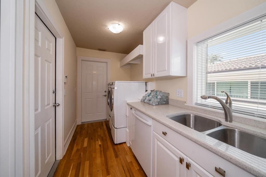 Utility room off kitchen, wine cellar at the back.