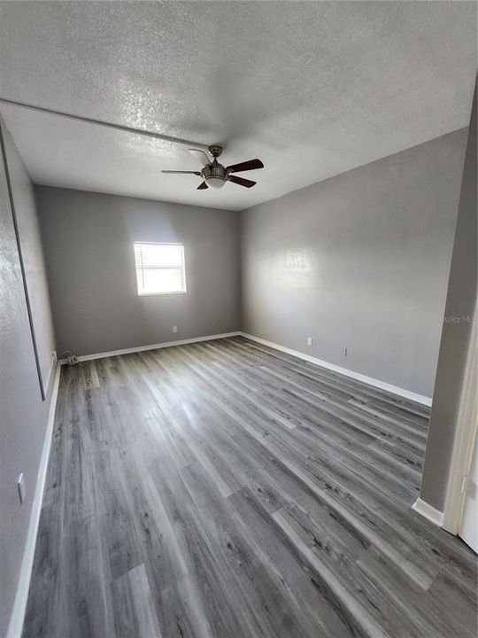 Primary Bedroom is very large.  Has an ensuite bathroom and large walkin closet where the Washer and Dryer are also connnected in the back of the closet