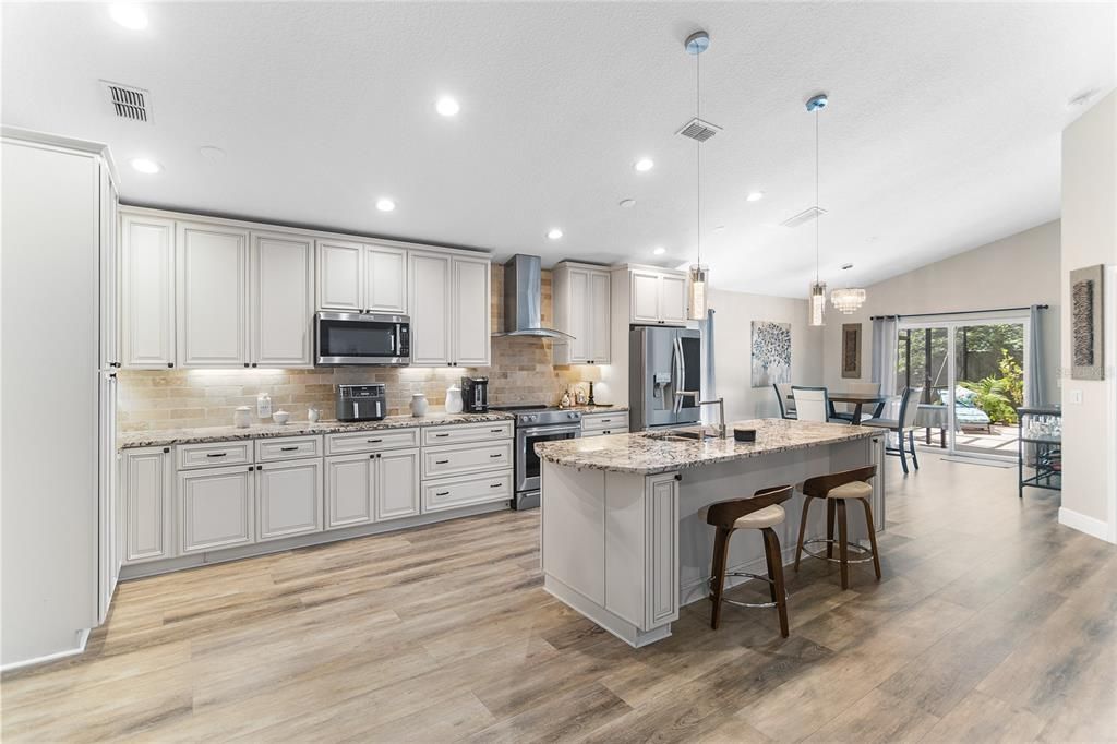 Open concept; living room, kitchen, dining area