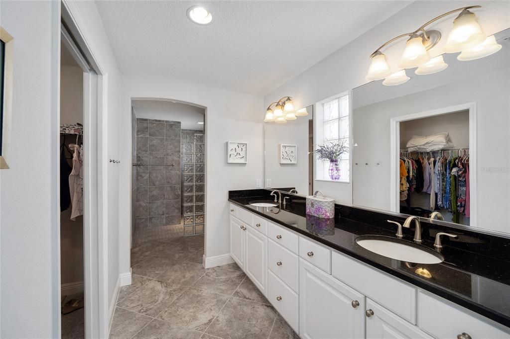 Primary Bath with Dual Vanity and Walk in Closet