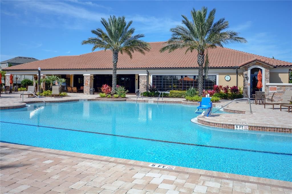 Amenities Pool with the Clubhouse in view. The pool is heated during the cooler months.