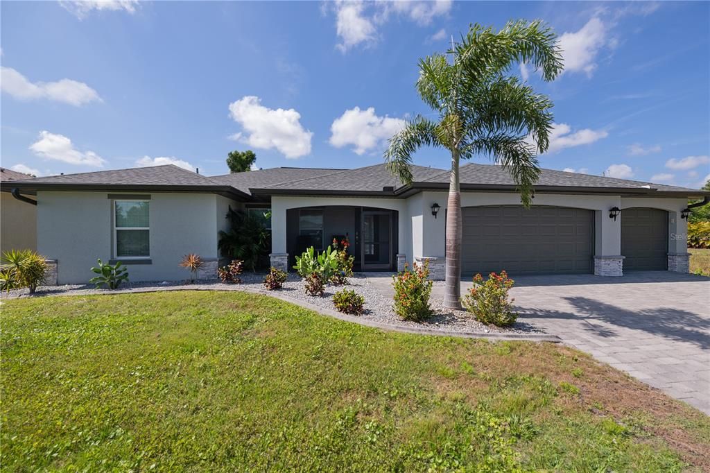 Welcome to 22411 Bette Ave! Three-car garage and LOTS of driveway parking.