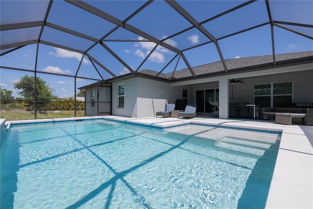 Inviting, sparkling pool! Heated for year-round enjoyment.