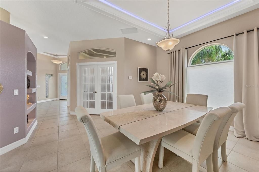 Formal Dining Room with special multi-colored lighting in the trayed ceiling