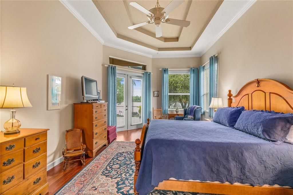 Master bedroom features double tray ceiling