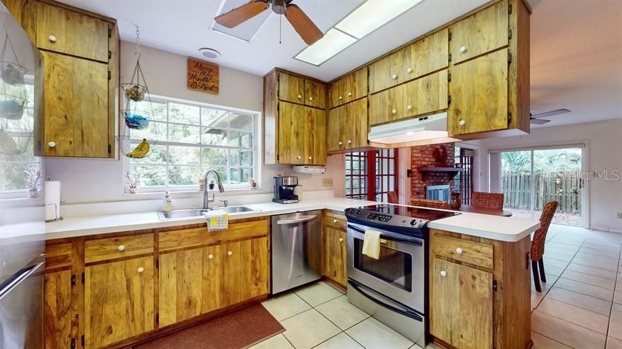 KITCHEN WITH BACKYARD VIEWS