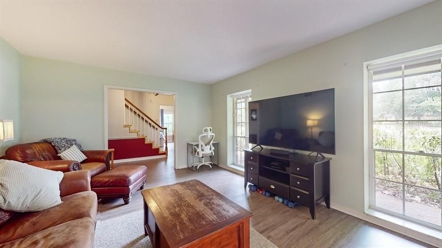 FORMAL LIVING ROOM WITH FOYER VIEWS