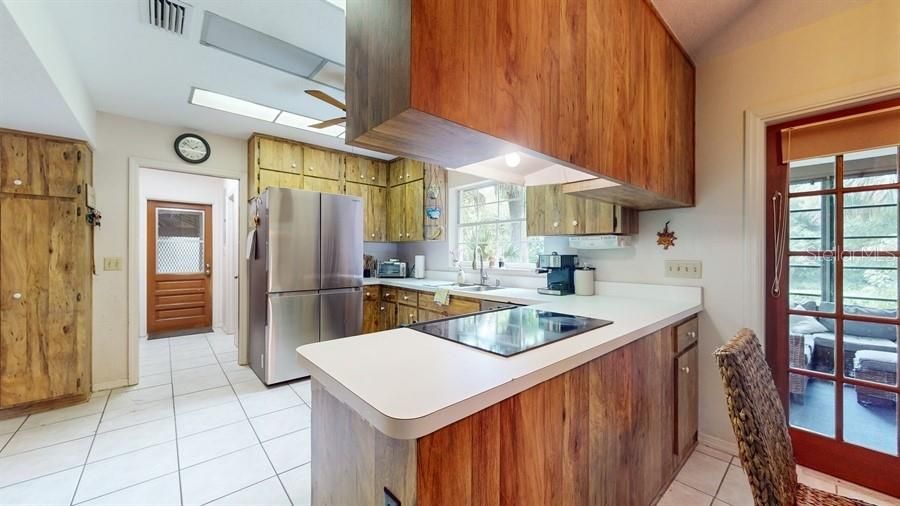 KITCHEN OVERLOOKING NATURAL BACKYARD