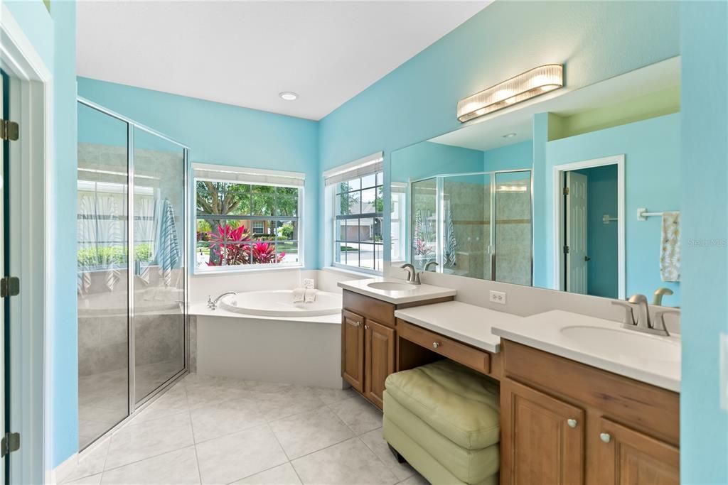 Primary Bathroom w/ Dual Sinks, Walk-in Shower, Garden Tub and Two Walk-in Closets