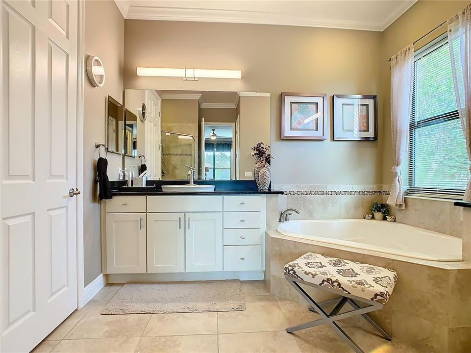 En-suite Bathroom with Garden Tub and Dual Sinks.