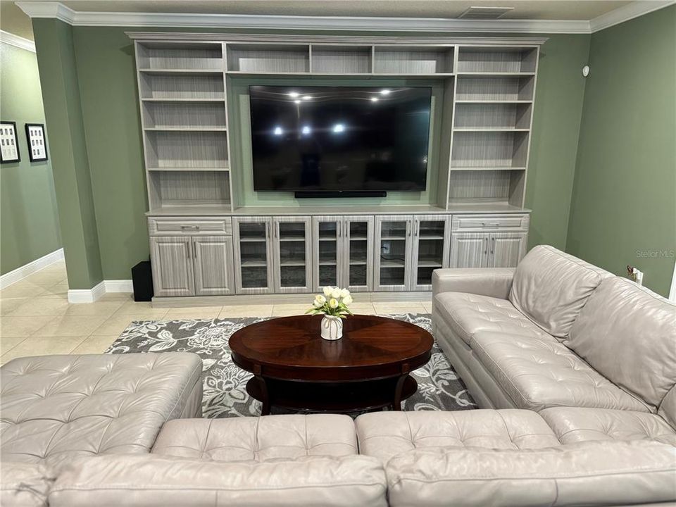 Beautiful built-in shelves and media center.