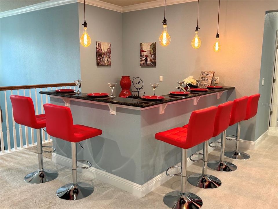 The upstairs wet bar, perfect for hosting parties!
