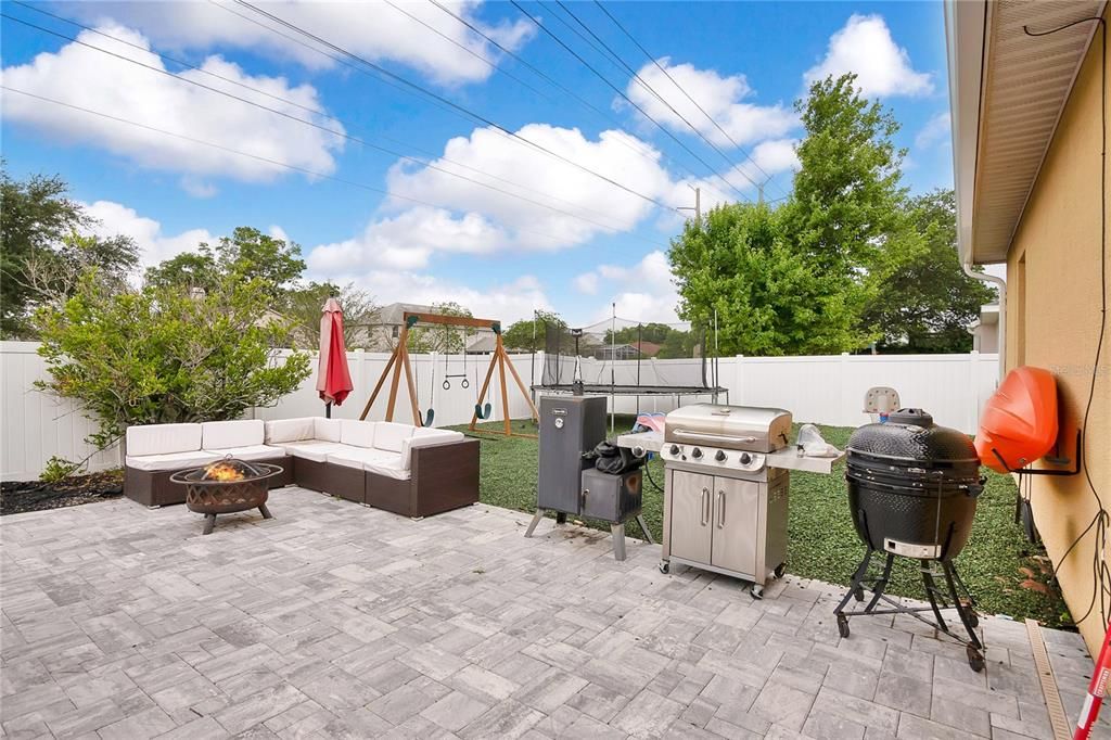 Huge fenced-in paver patio