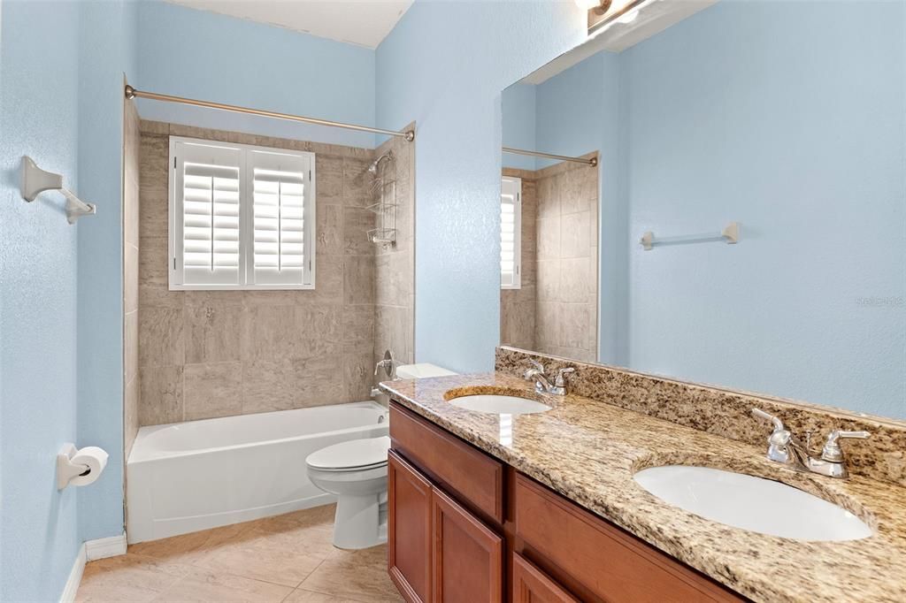 Second Full Bathroom -  Off Guest Hallway; Dual Sinks and Granite Countertop