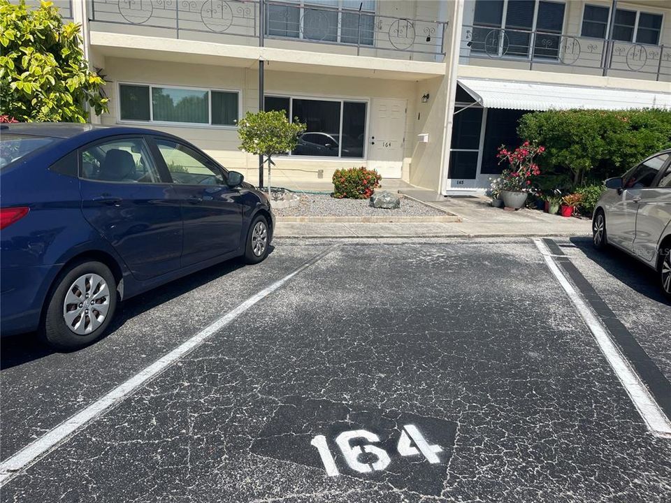 Designated parking spot is immediately in front of the condo.
