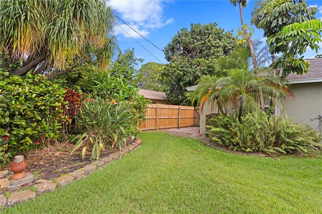 Pristine landscaping and privacy fencing are part of this lovely home.