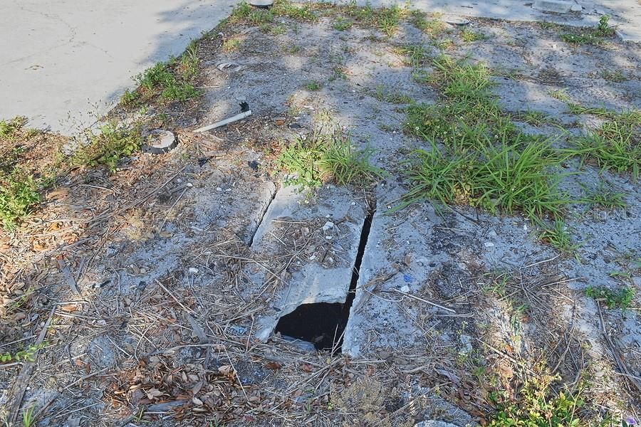 Old Septic, Should be Covered, but Please take Caution when walking the lot!