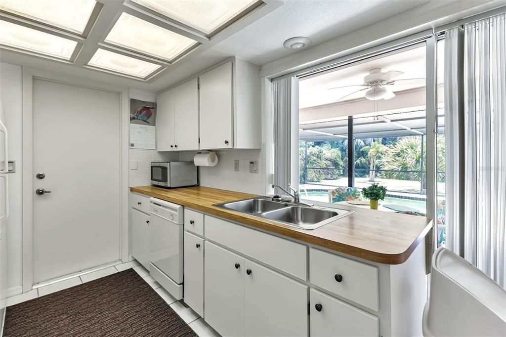 The undermount counters opens to the lanai. Very convenient for entertaining!