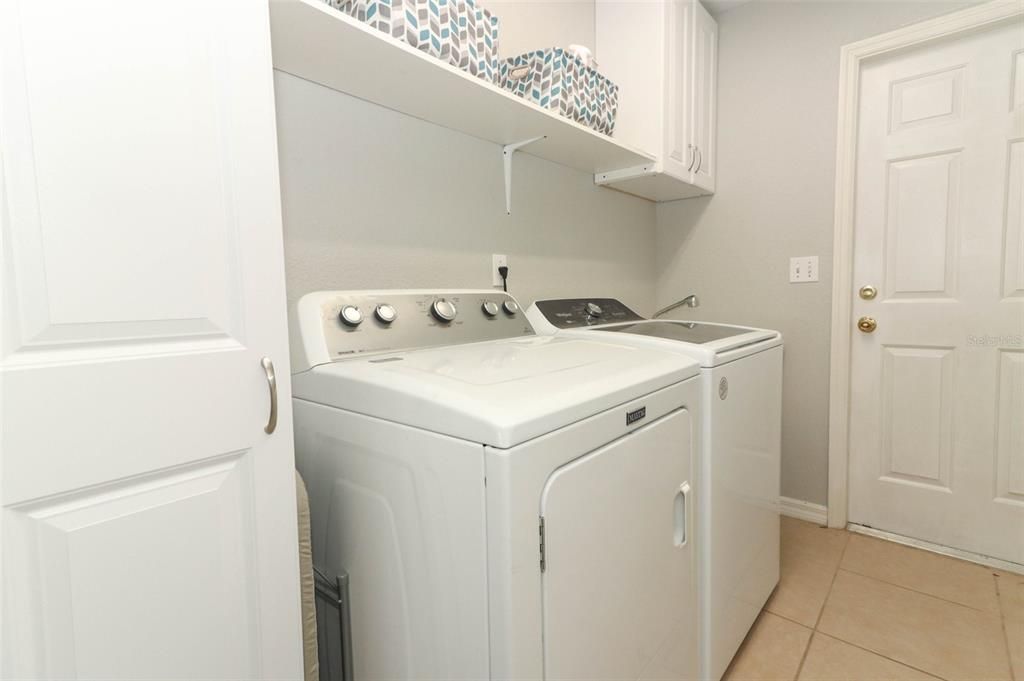 Interior Laundry Room with Storage Cabinets