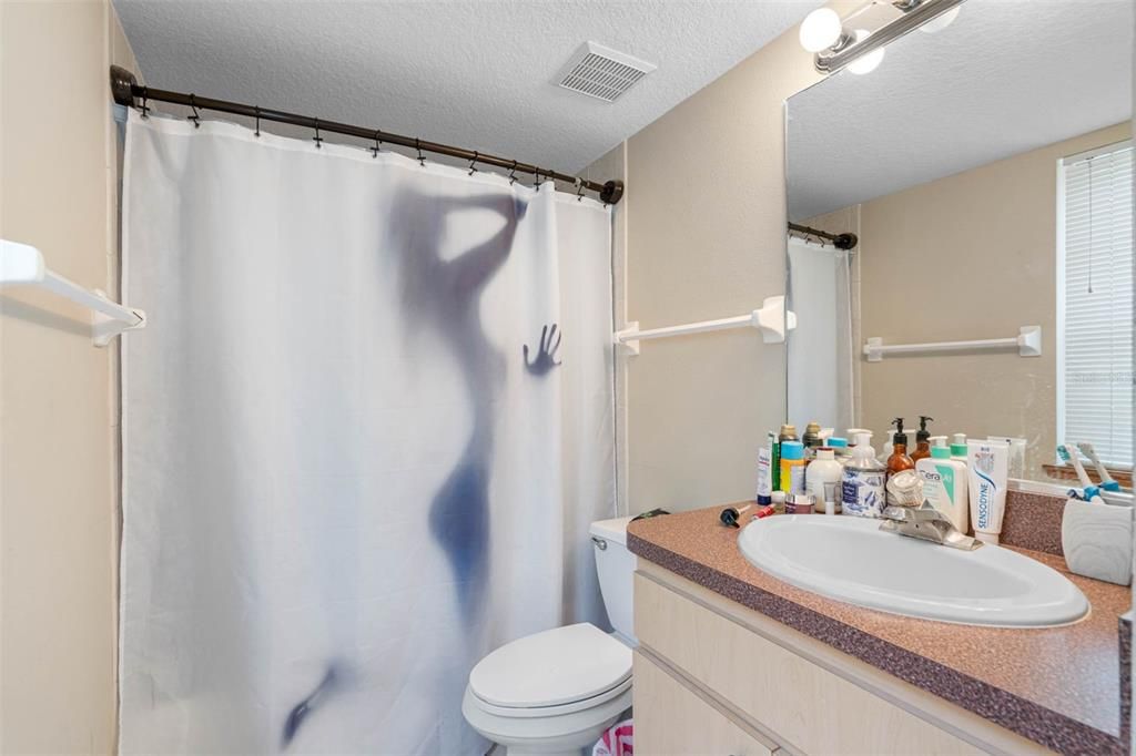 APT 2 - Primary ensuite bathroom (tub with shower combo)