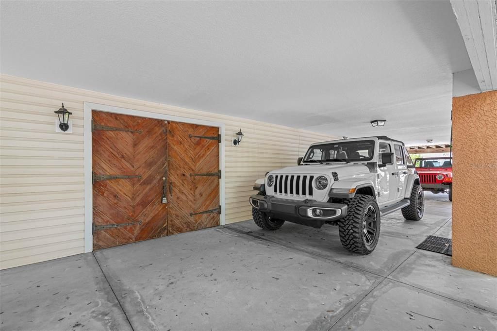 Apt 2 garage/storage + carport covered parking