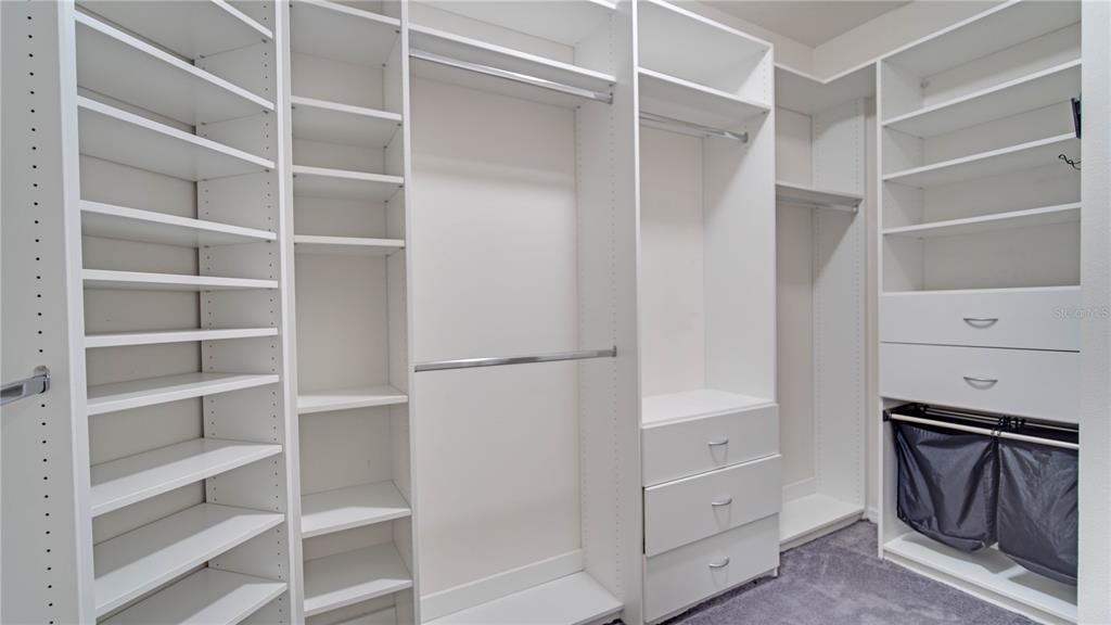 Master Closet -Custom designed closet system with drawers and shelves