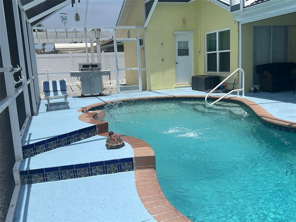 Sparkling pool, a dream for the lap swimmer or family fun, showing pool bath door