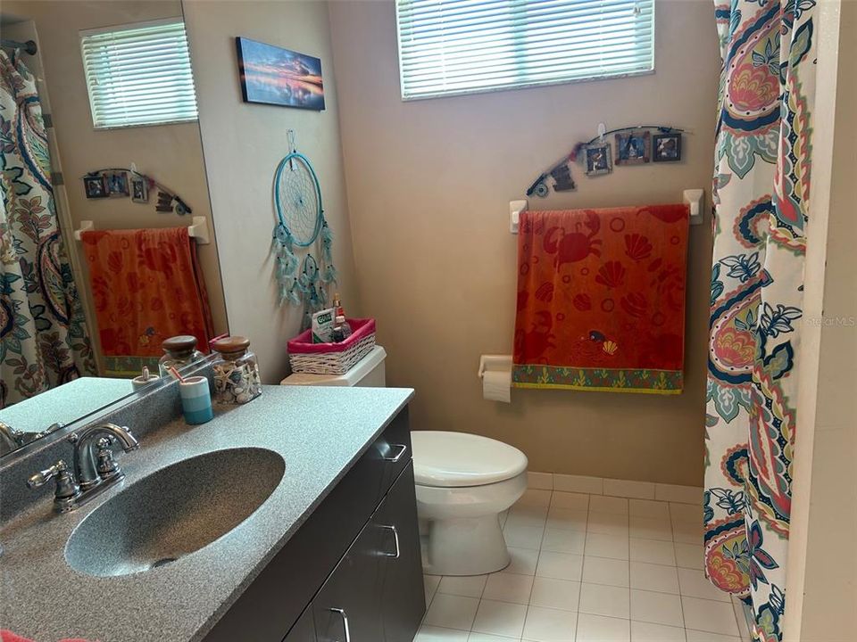 En-suite 3rd bath has glassed stall shower