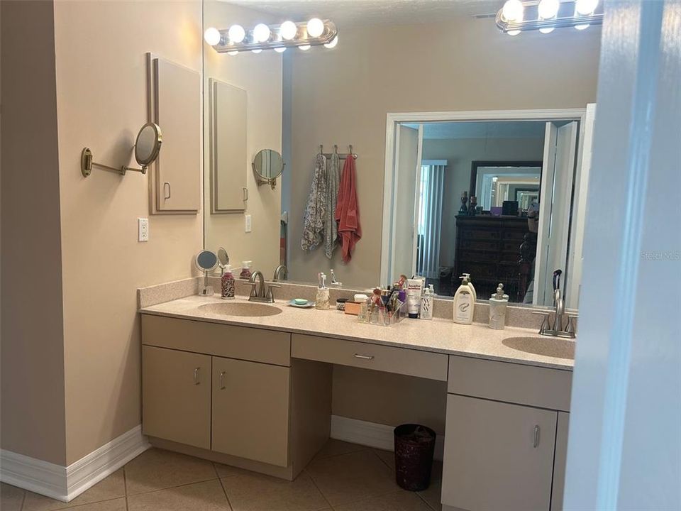 Dual sinks, vanity area & Corian counters