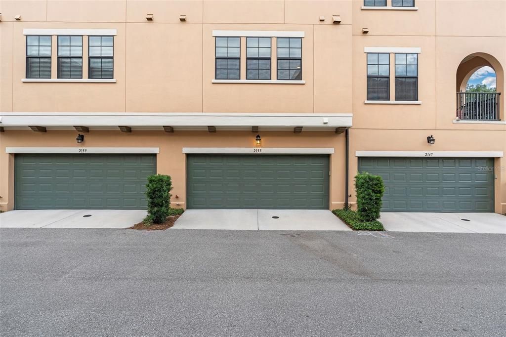 Two-car garage with water spigot.