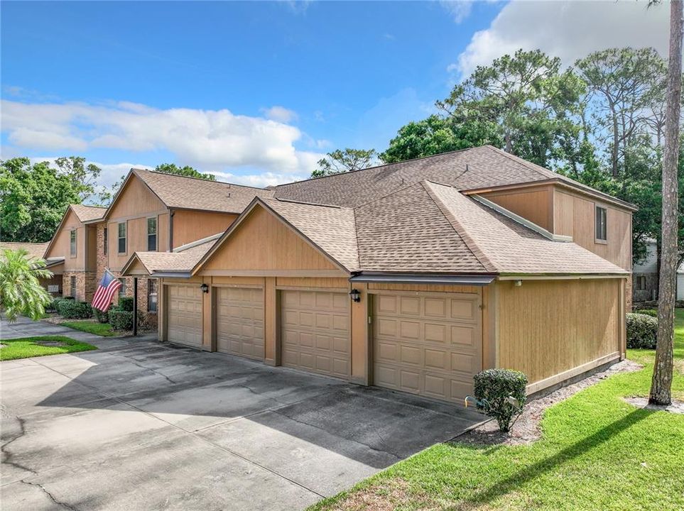 Exterior condo, new roof,  1-car garage and assigned parking space