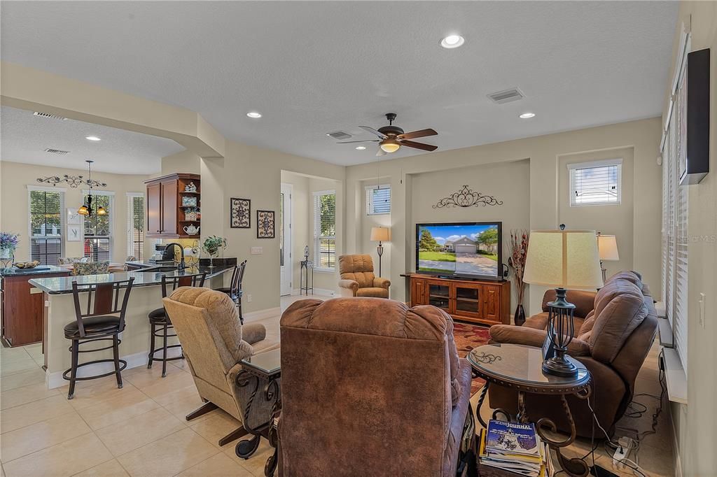 Great Room/Breakfast Bar Open Floor Plan - 353 Salt Marsh Ln, Groveland, FL 34736