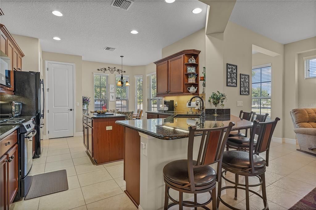 Kitchen Open Floor Plan - 353 Salt Marsh Ln, Groveland, FL 34736