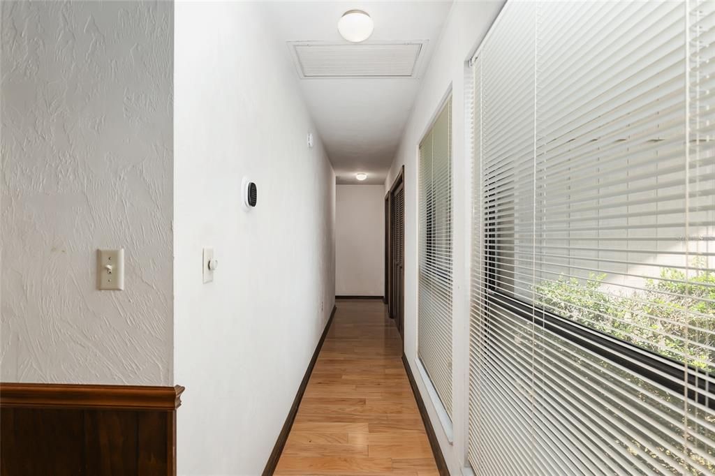 HALLWAY TO BEDROOM AREA