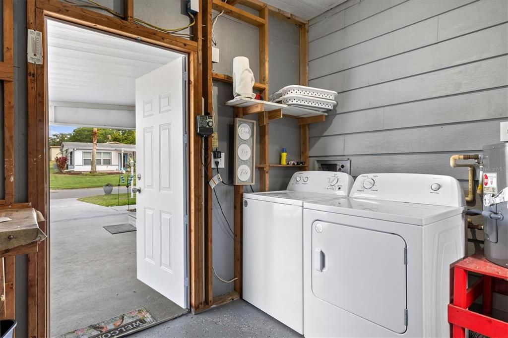 Large Laundry Shed with Appliances and Garage Door for Golf Cart