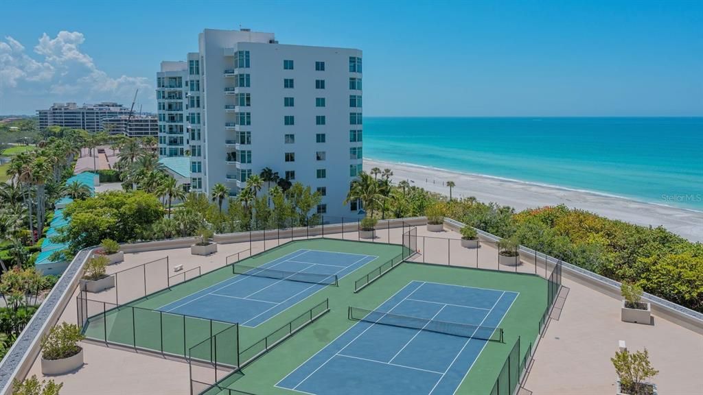 Amenities include elevated tennis courts, and look at the view!