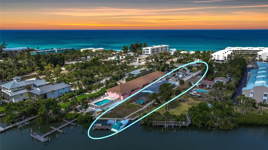 Bay side with boat slips, saltwater pool and designated beach access