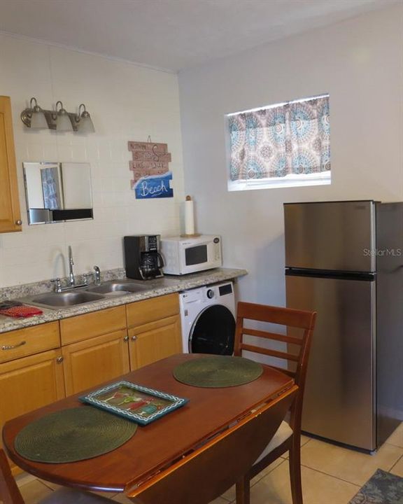 Efficiency/Mother in law suite  kitchenette area complete with dinette and kitchen area