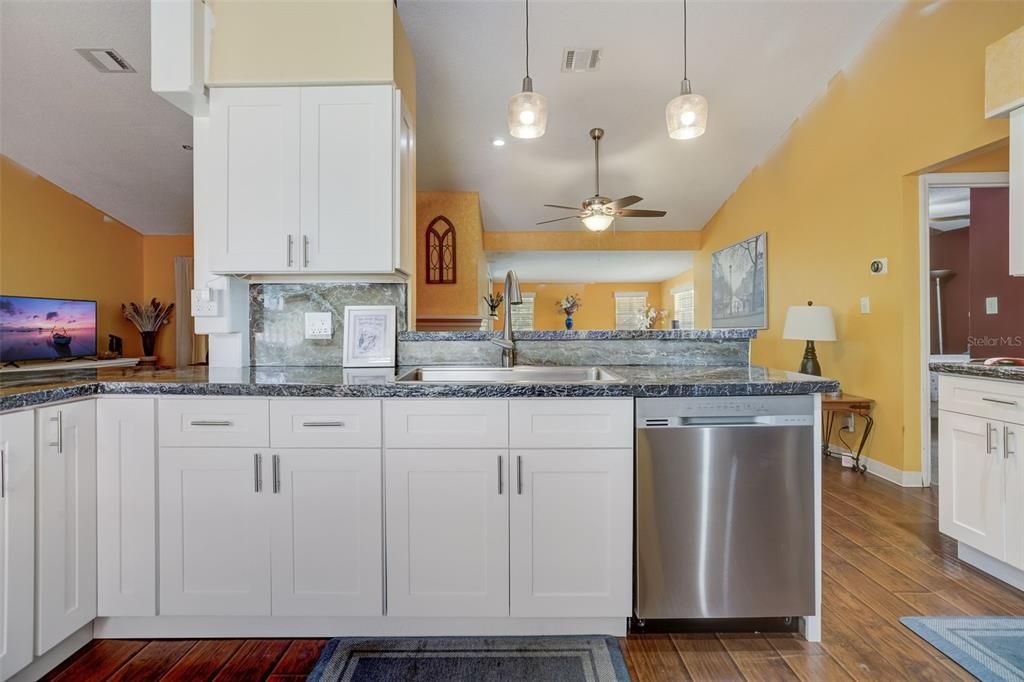 the KITCHEN was RENOVATED with NEW CABINETS, REFINISHED COUNTERTOPS, and BRAND-NEW STAINLESS-STEEL APPLIANCES INCLUDING A GAS RANGE for your CLEAN COOKING NEEDS!!
