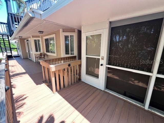 Enrty to Second Floor Sunroom and Patio Deck