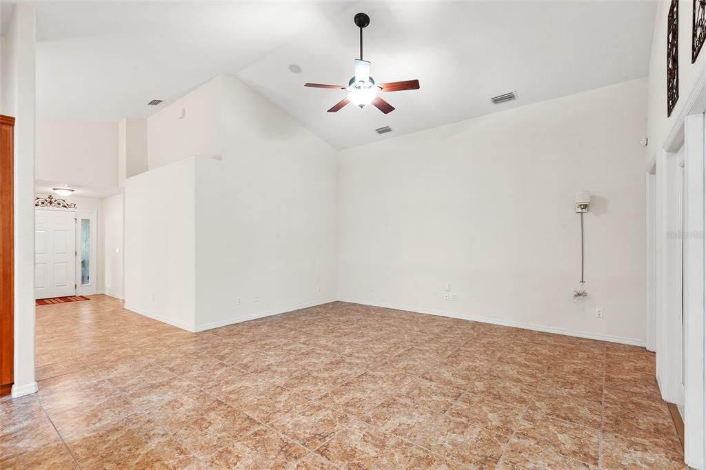 FAMILY ROOM WITH VIEW TOWARDS FOYER & FRONT DOOR